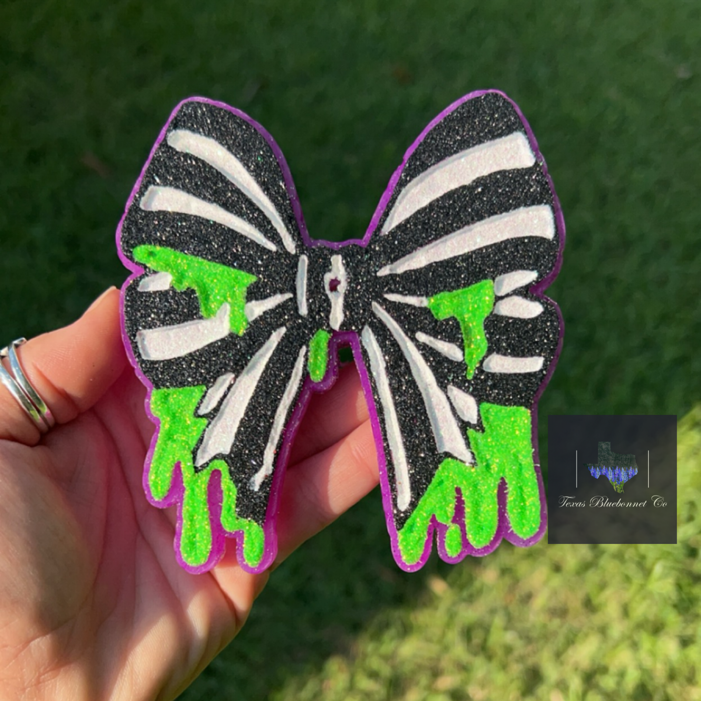 BEETLE JUICE BOW (NEON PURPLE BACKGROUND)