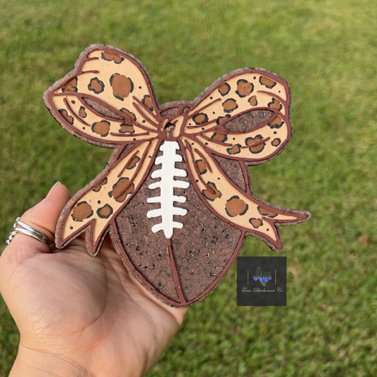 LARGE FOOTBALL W/ CHEETAH BOW